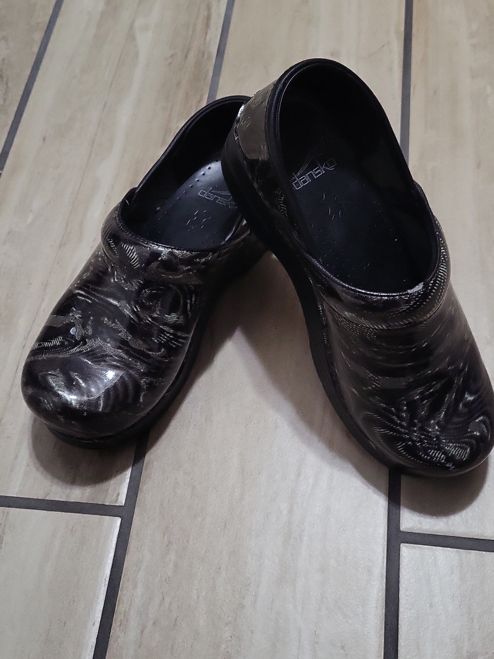 Dansko Black Metallic Patterned Slip-On Clogs